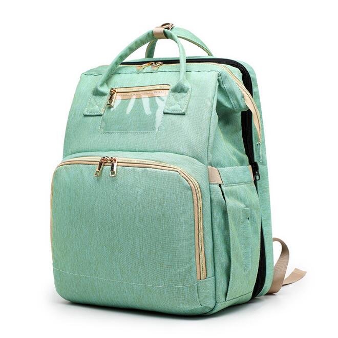 2-in-1 Baby Folding Travel Crib & Mommy Bag