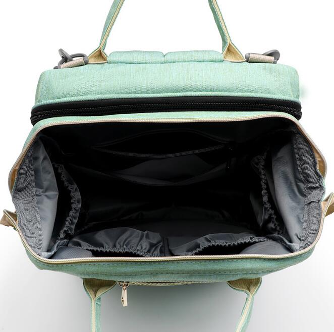 2-in-1 Baby Folding Travel Crib & Mommy Bag